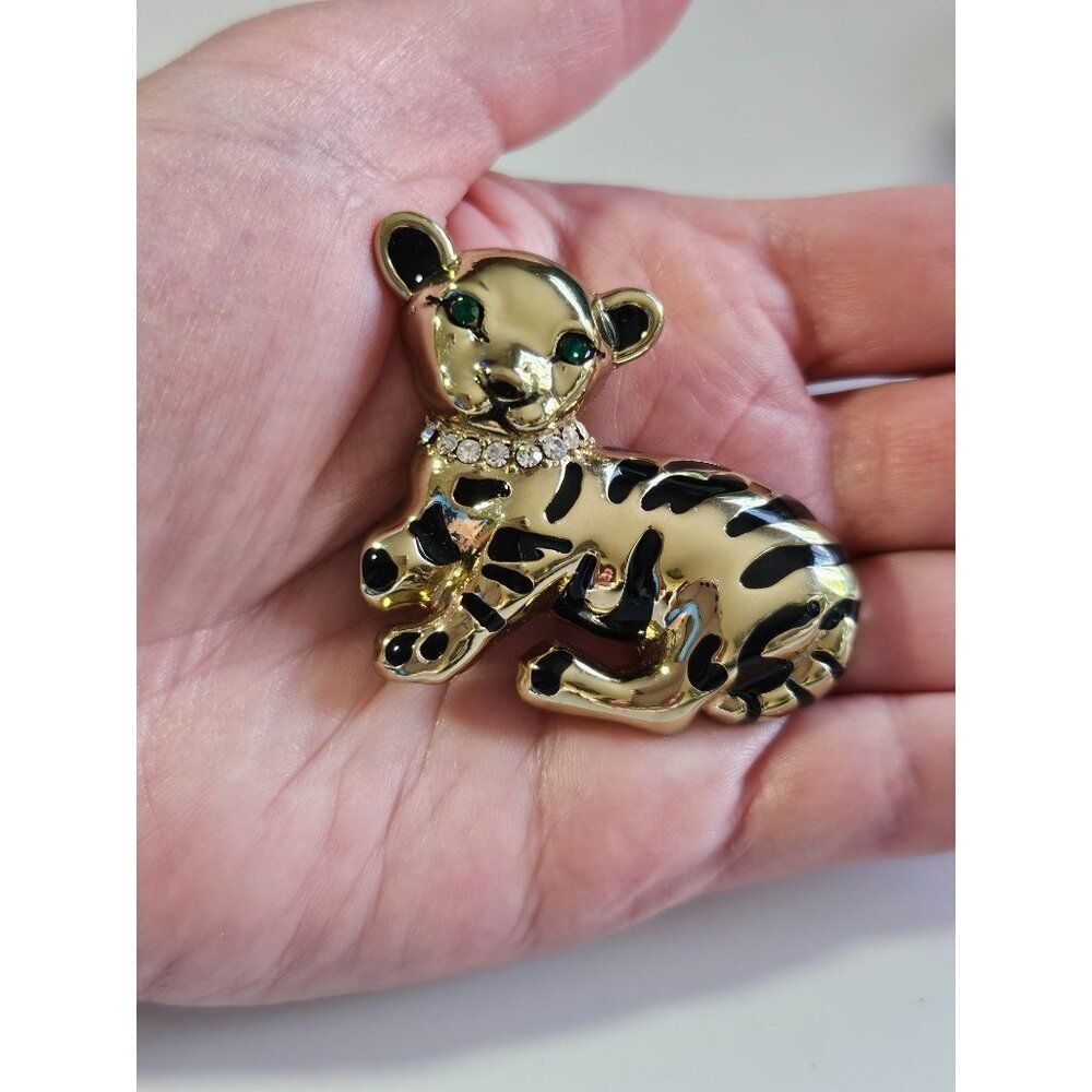 Gold tone black enamel tiger pendant